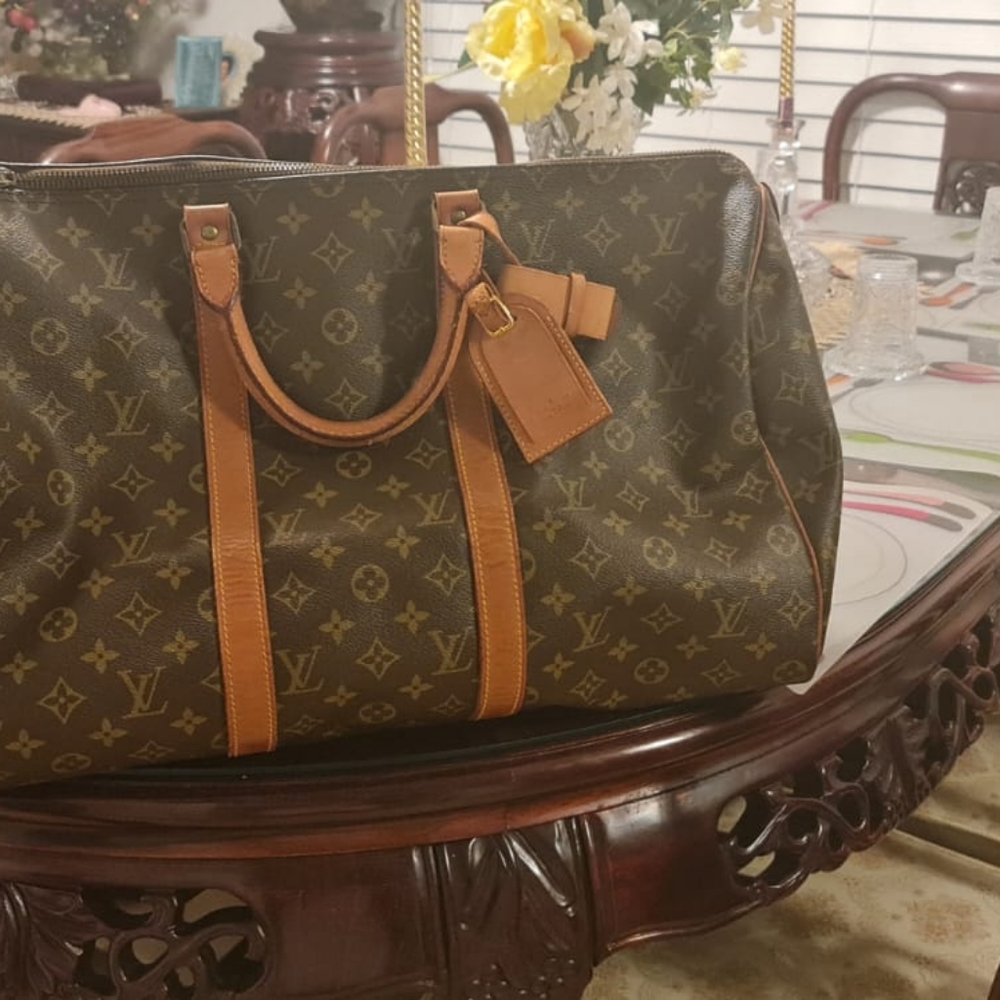 Louis Vuitton genuine carryon luggage with LV lock